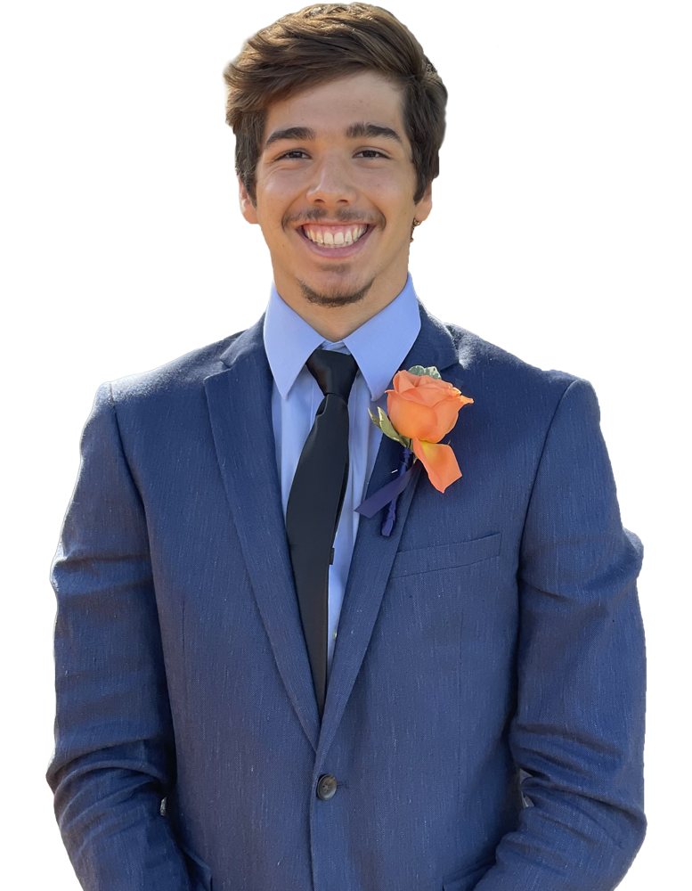 Caio Cavarsan smiling in a blue suit and black tie with an orange rose boutonniere.