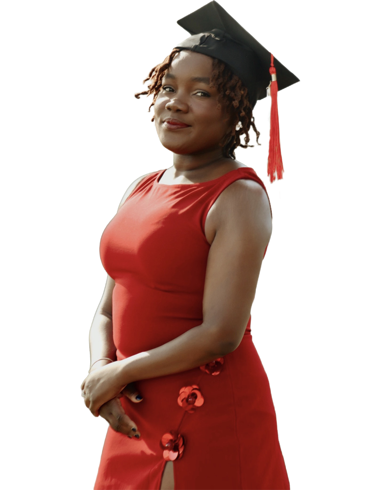 Tatyana Turner posing in a red sleeveless dress and a graduation cap with a red tassel.