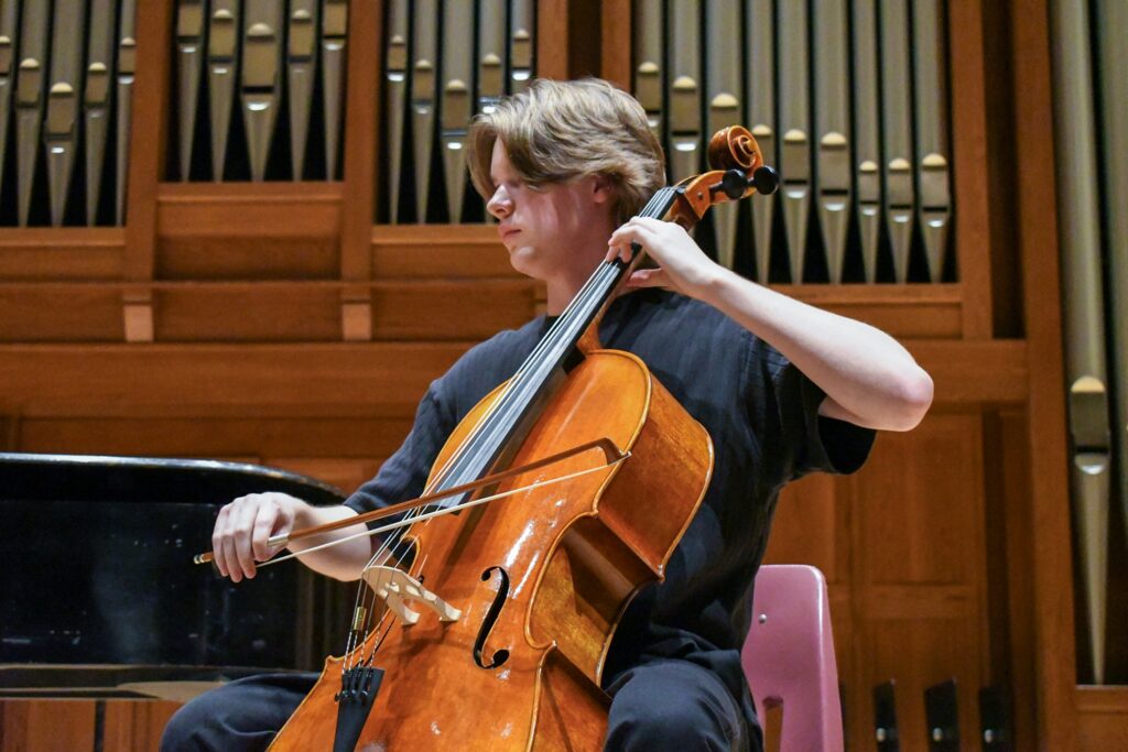 Student plays cello