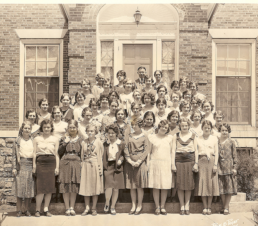 A historical group photograph of female Melrose Hall residents from the 1930–1931 academic year posing on the building steps.