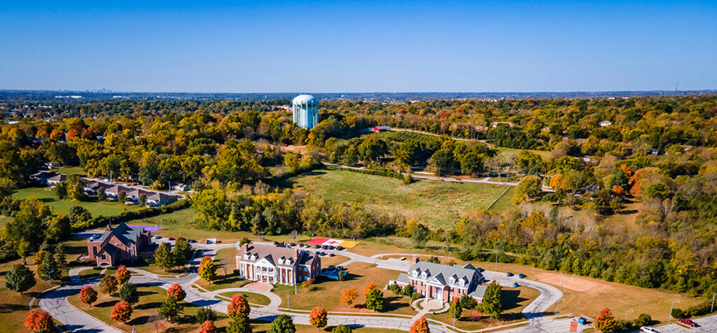 drone shot of 3 fraternity houses