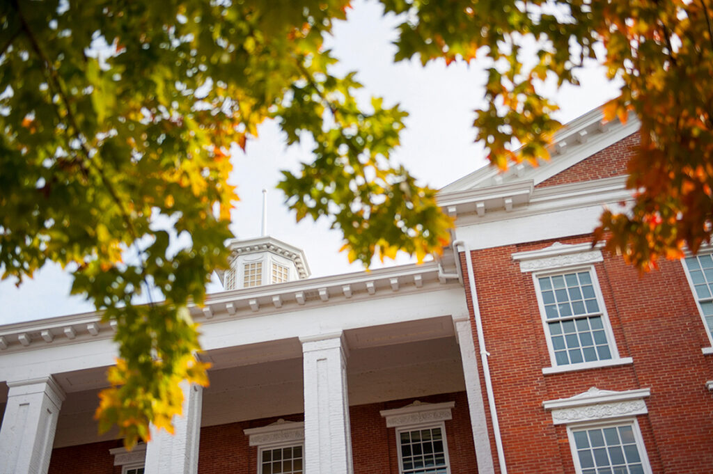Jewell Hall cupola on rooftop amidst fall leaves