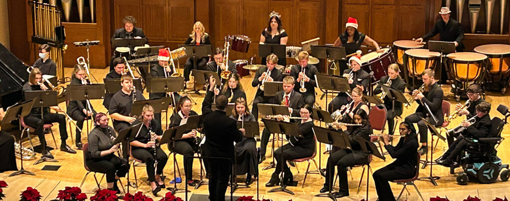wind ensemble band in concert on chapel stage