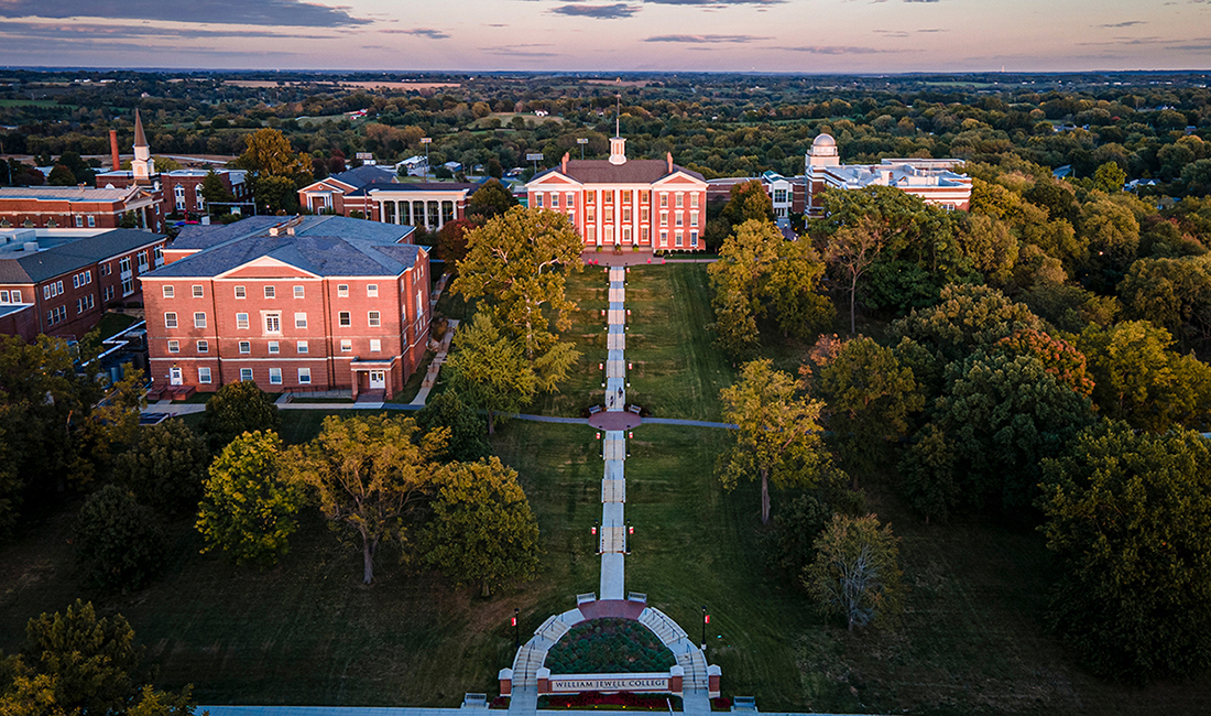 aerial of campus buildings at dusk