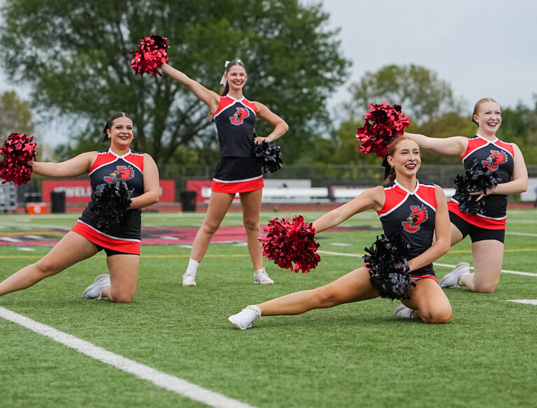 dance team performing on football field