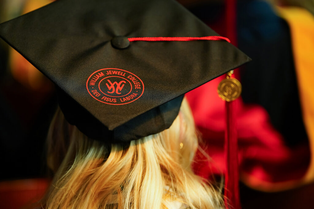 closeup of graduation cap with Jewell seal and tassel