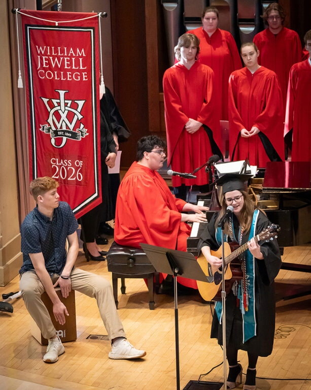 pianist and vocalist on chapel stage performing